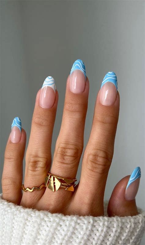 Leave a small gap between the blue tip and the rest of the nail, allowing the natural nail to show through. . Sky blue french tip 15 meaning